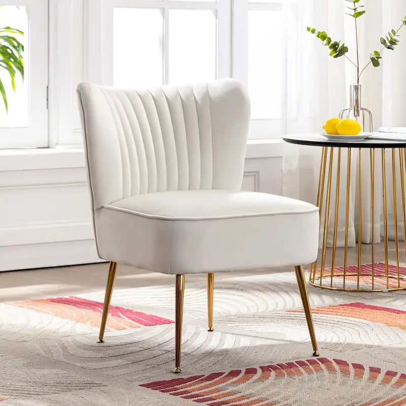 Fauteuil d'appoint capitonné en velours avec pieds dorés